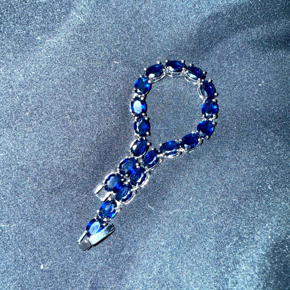 8 other reasons: blue gem silver bracelet